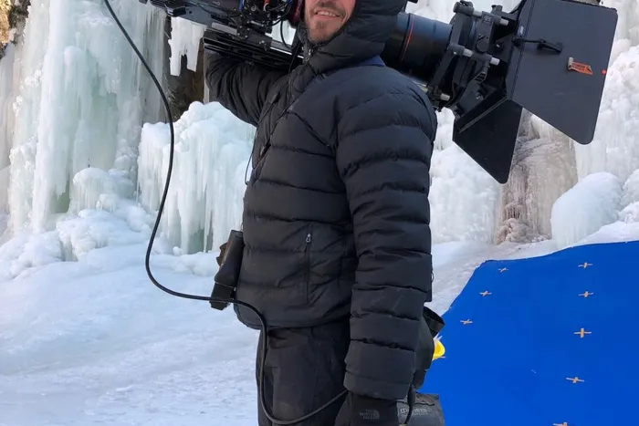 Focus puller Jeff Hammerback positions the Alexa on the icy cliffs