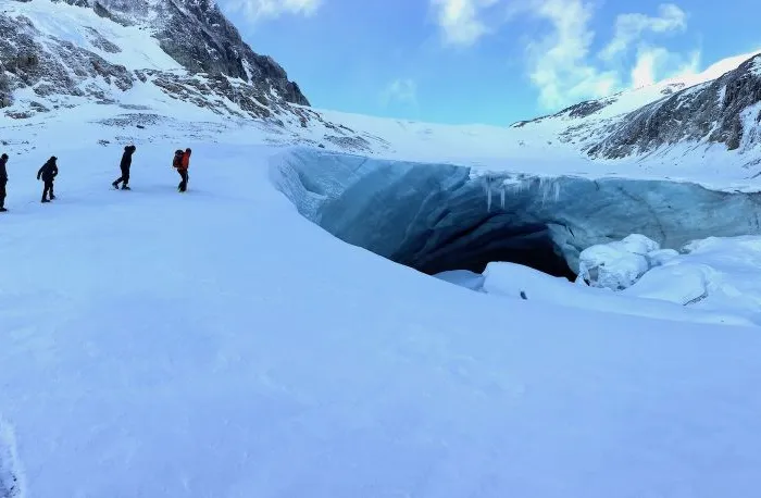 Scouting a natural ice cave in British Columbia.