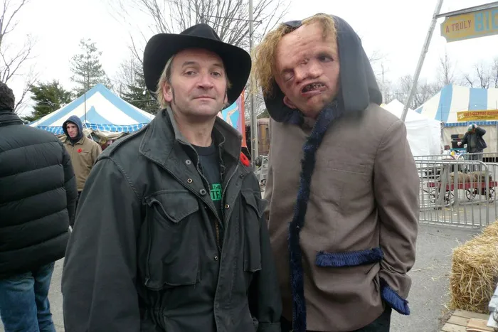 One of these guys is a sideshow freak.