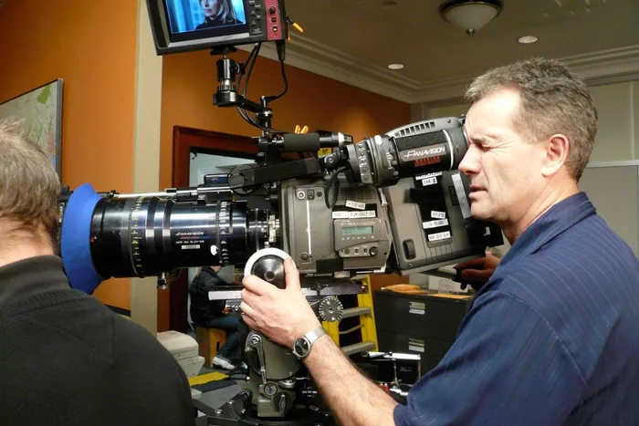 Master camera operator Chris Harris lines up a shot with the Panavision Genesis camera.