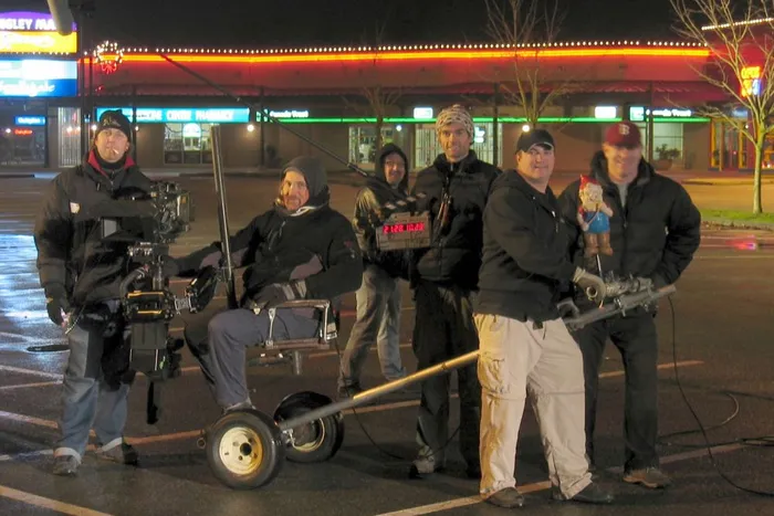 A home-made rickshaw allows steadicam operator Cliff Hokanson to lead a foot chase.