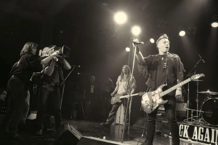On stage with Hard Core Logo. Photo by Lianne Henscher.