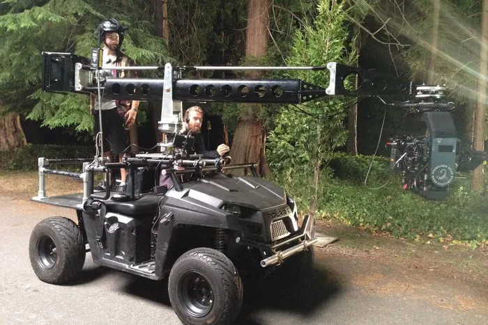 Chris Tambosso and Lee Buckley operate the silent, battery operated ROVER EV1 Camera Car.
