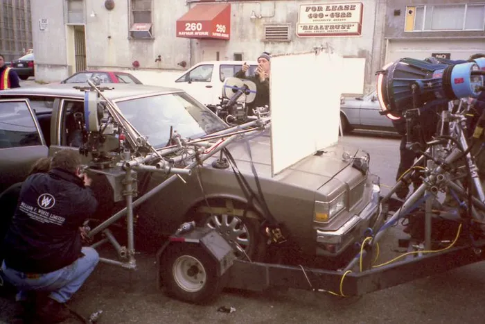 Rigging a tow car in Toronto with lights and camera mounts.