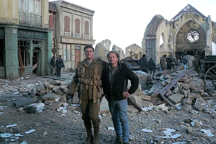 Writer/director/actor Paul Gross and I on the ruined village set.